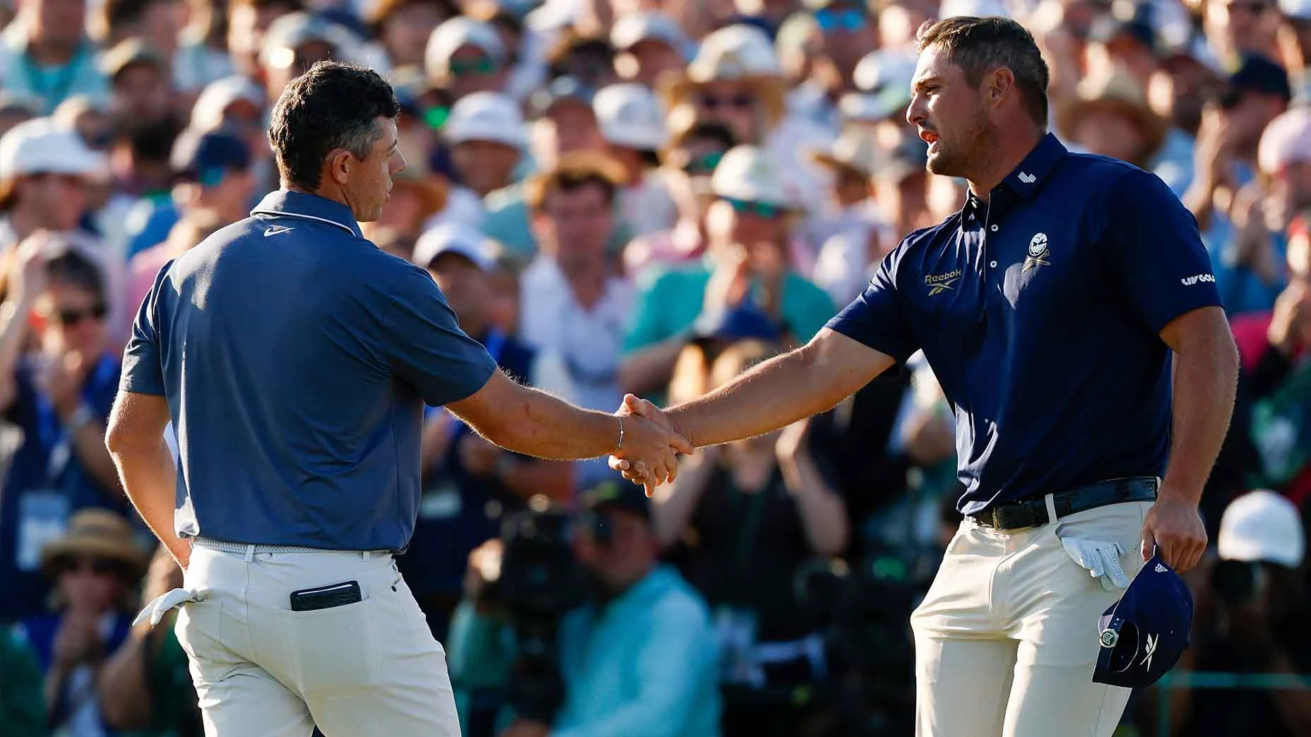 Rivalitas Tajam di Augusta: McIlroy Memimpin, DeChambeau Gagal Masuk Cut, dan Drama di Balik Layar