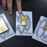 Harga Emas Antam Turun Rp 5.000, Apa Penyebabnya?