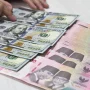 Mata Uang Asia Bergolak: Rupiah Menguat, Iran Terpuruk, dan Harga Emas yang Membingungkan