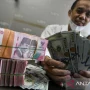 Rupiah Menguat Setelah BI Naikkan Suku Bunga Acuan