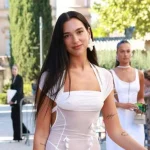 Dua Lipa Rayakan Pernikahan dengan Gaun Putih, Sementara Dunia Menghadapi Berbagai Konflik