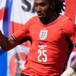 Djed Spence Tampil Mengesankan di Piala Dunia 2026, Tapi Apa yang Terjadi dengan Masker Wajahnya?