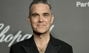 Insiden Robbie Williams dan Penggemar di Stadion: Antara Kontroversi dan Kecintaan