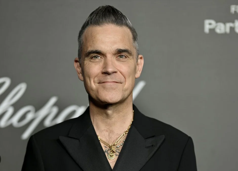 Insiden Robbie Williams dan Penggemar di Stadion: Antara Kontroversi dan Kecintaan